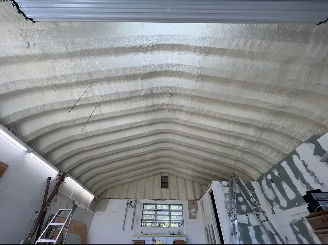 Spray polyurethane foam applied to the underside of a metal roof deck in North Reading
